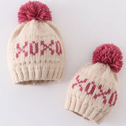 Cream XOXO knit beanie pom pom hat