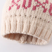 Cream XOXO knit beanie pom pom hat