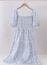 Navy smocked floral puff sleeve dress