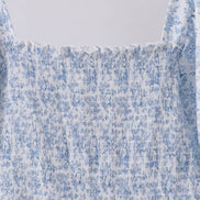 Navy smocked floral puff sleeve dress