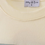 Yellow cross sheep embroidery top
