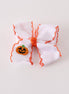 Orange Jack-O-Lantern embroidery crochet edge hair bow
