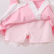 Pink scalloped active skorts set