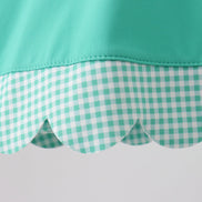 Green scalloped bow active dress