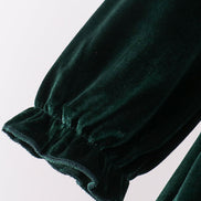 Green velvet bow dress