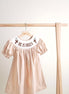 Khaki he is risen hand-smocked girl dress
