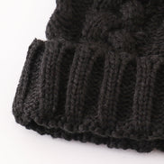 Black pompom cable beanie hat
