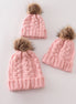 Pink pompom cable beanie hat
