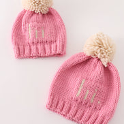 Pink pompom hi cable beanie hat