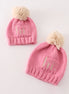 Pink pompom hi cable beanie hat