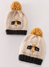 Beige pompom bee cable beanie