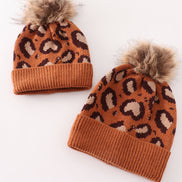 Brown pompom leopard cable beanie hat
