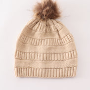 Beige pompom cable beanie hat