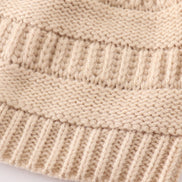 Beige pompom cable beanie hat