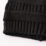 Black pompom cable beanie hat