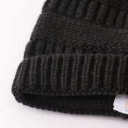 Black pompom cable beanie hat