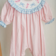 Pink candy cane bow hand smocked ruffle romper