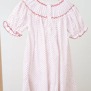 Pink christmas bishop hand smocked dot dress