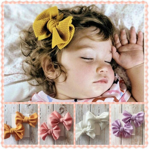 Collage of a child with a yellow hair bow and various colored hair bows on a wooden surface.