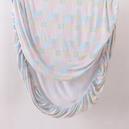 Pink floral checkered bamboo crib sheet