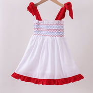 White smocked jacquard ruffle dress