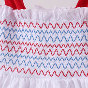 White smocked jacquard ruffle dress