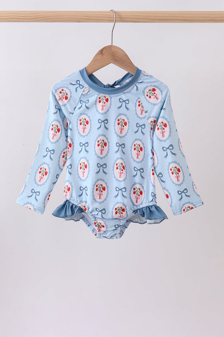 Blue strawberry bow ruffle rashguard