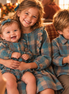 Editorial teal plaid Thanksgiving sibling portrait